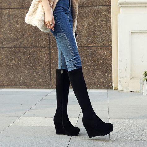 Black wedge boots