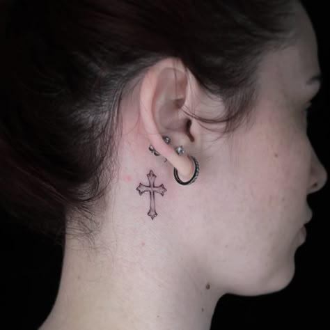 35+ Cross Tattoo Ideas for Women Cross Tattoo Behind The Ear, Cross On Neck Tattoo, Behind The Ear Tattoo Ideas Cross, Behind Ear Tats Cross, Cross Tattoos For Women Behind The Ear, Ear Cross Tattoo, Behind The Ear Cross Tattoo, Cross Behind Ear, Cross Behind Ear Tattoo