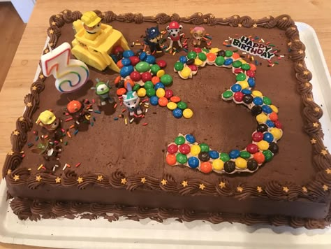 Paw patrol on Costco chocolate cake Paw Patrol Brownies, Easy Diy Paw Patrol Cake, Paw Patrol Cake Easy Diy, Paw Patrol Chocolate Cake, Chocolate Paw Patrol Cake, Paw Patrol Diy Cake, Paw Patrol Cake 3rd Birthday, Homemade Paw Patrol Cake, Easy Paw Patrol Birthday Cake