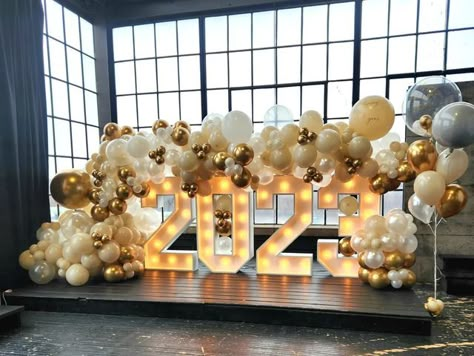 Mississauga Balloons Decoration- Events on Instagram: "Loving the colours of my last decoration of 2022! Usually black and gold colors are chosen for NYE decorations. I really love when clients ask for things out of the normal pattern. . Marquee numbers @markeyevents.decor . #canada #ballooncolumns #balloongarland #balloonbouquet #balloondecoration #goldballoons #mississaugaballoons #torontoballoons #nyedecor #nyeballoons #nyepop #nyetoronto #marqueenumbers #nyemississauga #torontoballoons #ny Nye Balloons, Balloon Tutorials, Marquee Numbers, Nye Decorations, Wall Layout, Church Anniversary, First Birthday Balloons, Balloons Decoration, Bridal Shower Balloons