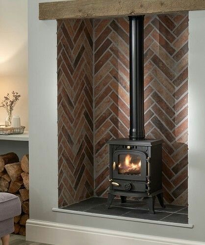 Brick Style Tiles, Wood Burner Fireplace, Log Burner Living Room, Hearth Tiles, Fireplace Heat, Topps Tiles, Red Tiles, Freestanding Fireplace, Chimney Breast