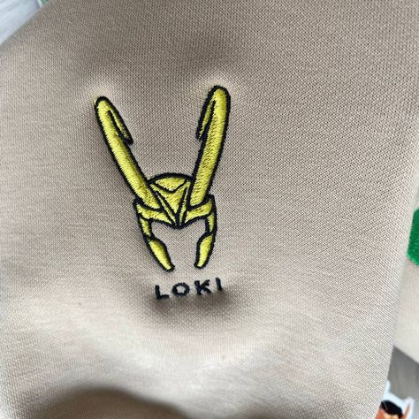 Marvel Loki Nike Embroidered Sweatshirt Check more at https://jerryclothing.com/product/marvel-loki-nike-embroidered-sweatshirt/ Nike Embroidered Sweatshirt, Marvel Loki, Marvel Sweatshirt, Loki Laufeyson, Embroidered Sweatshirt, Embroidered Sweatshirts, Loki, Taylor Swift, Swift