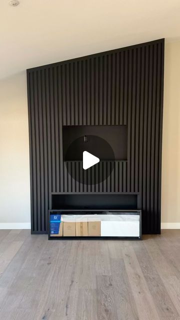 Accent Wall Designs on Instagram: "Installing one of the VERY first @touchstonehomeproducts Sideline Elite PRO series fireplaces 🔥. The simplest to install yet, and SO many awesome new features!  Too many to list, but some of my favorites are the addition of down lights, built-in crackling speakers, black crystals, charred driftwood and a mirrored back panel.  More to come from this build, but couldn’t wait to share! 🙌
.
#fireplace #electricfireplace #accentwall #livingroomdecor #designideas #interiordesign #remodel #walldecor" Diy Tv And Fireplace Wall, Modern Fireplace Design Ideas, Fireplace Frame Ideas, Fireplace Ideas Brick, Wood Slat Fireplace Wall, Feature Fireplace Wall, Fluted Fireplace, Black Fireplace Wall, Wall Behind Tv