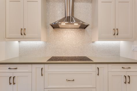 Does this sparkly gold backsplash remind anyone else of New Year’s Champagne? We think there are going to be many happy memories made in this remodeled kitchen! #remodel #homeremodeling #homedesign #renovation #KGTremodeling #SWFL Champagne Backsplash Kitchen, Gold Backsplash, Backsplash Kitchen, Home Remodel, Naples Florida, Tiny Kitchen, Happy Memories, Kitchen Backsplash, A Kitchen