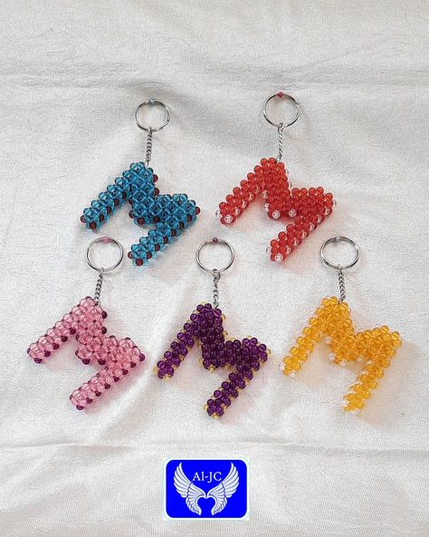 Beaded alphabet keychains are charming and functional accessories featuring individual letters crafted from colorful beads. *Personalization:* Customize your keys with your initials or spell out your name for a unique touch. *Gifts:* They make thoughtful, personalized gifts for friends, family, or colleagues. *Bag Accessories:* Attach them to your bag zipper or strap for added style and easy identification. *School Backpacks:* Ideal for students to add personality to their backpacks a... Touch Gifts, Spell Out Your Name, Personalized Gifts For Friends, Keychain Making, Alphabet Charms, Bead Keychain, Personalised Gifts For Friends, M Letter, Alphabet Beads