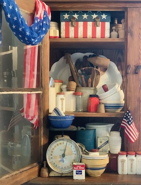 Patriotic Decor Ideas, Vintage Lunch Boxes, Vintage Patriotic, Hutch Decor, Summer Mantle Decor, Fourth Of July Decor, Rustic Wood Walls, Antique Dishes, House Decor Rustic