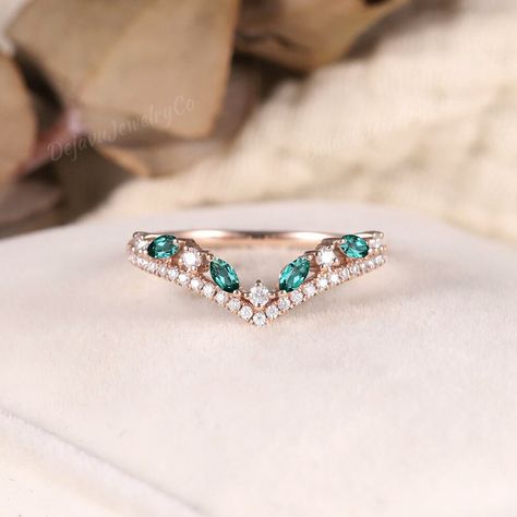 Graceful Marquise Shaped Emerald Curved Wedding Band, a Unique Moissanite and Diamond-Accented Promise Ring with a Curved Stacking Design. Crafted in Rose Gold, This Elegant Wedding or Promise Ring for Women Features a Stunning Emerald Centerstone, Offering Timeless Elegance and Romance. Moissanite wedding band:  https://www.etsy.com/listing/1511909251 Aquamarine wedding band: https://www.etsy.com/listing/1480701478 Black rutilated quartz wedding band: https://www.etsy.com/listing/1511135891 Per Wedding Rings With Emerald Accents, Curved Wedding Band For Oval Ring, Aquamarine Wedding Band, Amethyst Wedding Band, Promise Ring Diamond, Aquamarine Wedding, Emerald Wedding Band, Band Ideas, Wedding Band Unique