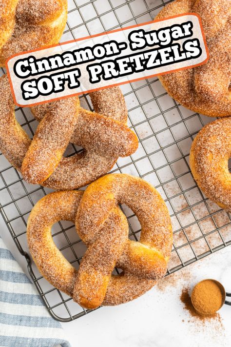 cinnamon sugar pretzels on a cooling rack Soft Sweet Pretzel Recipe, Cinnamon Soft Pretzels, Homemade Cinnamon Pretzels, Cinnamon Sugar Soft Pretzels Recipe, Pretzels Recipe Dessert, Cinnamon Pretzels Recipe, Cinnamon And Sugar Pretzels, Pretzel Recipe Cinnamon Sugar, Soft Cinnamon Pretzel Recipe