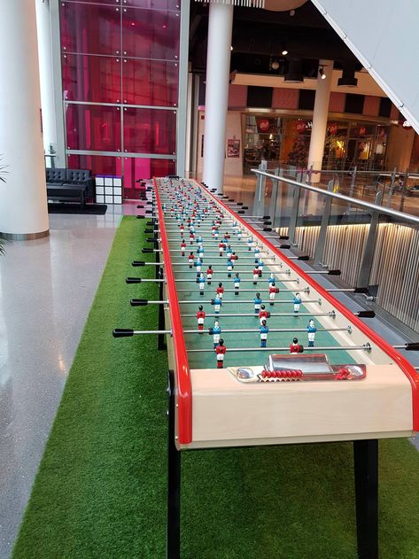 This giant Foosball table. Foose Ball Table Game Room, Foosball Table Aesthetic, Hype Room, Foose Ball Table, Foozeball Table Room, Fooseball Coffee Table, Luxury Foosball Table, 2024 Celebration, Brand Activation Ideas