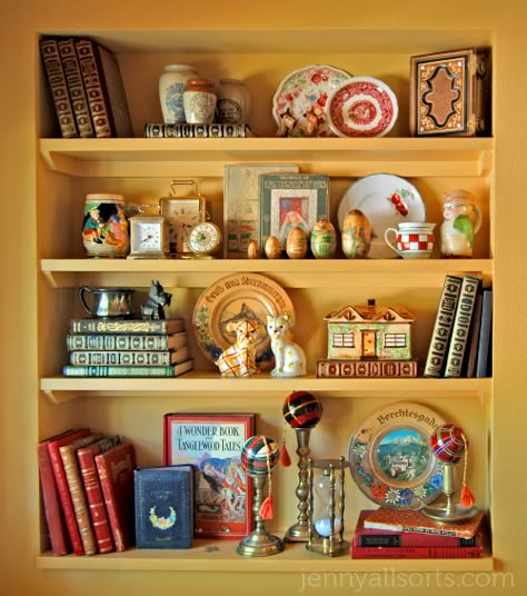 Intriguing shelves from Jenny Allsorts Maximalism Shelves, Maximalist Shelf Decor, Wall Sprinkles, Knick Knack Display Ideas, Cute Wall Shelf, Wall Shelf Arrangement, Curated Shelves, Nook Shelves, Hutch Styling