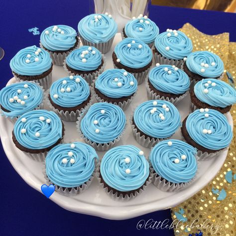 the cutest mini chocolate cupcakes topped with blue rosettes on them 💙 Mini Chocolate Cupcakes, Shower Cupcakes, Baby Shower Cupcakes, Chocolate Cupcakes, The Cutest, Baby Shower, Shower, Blue