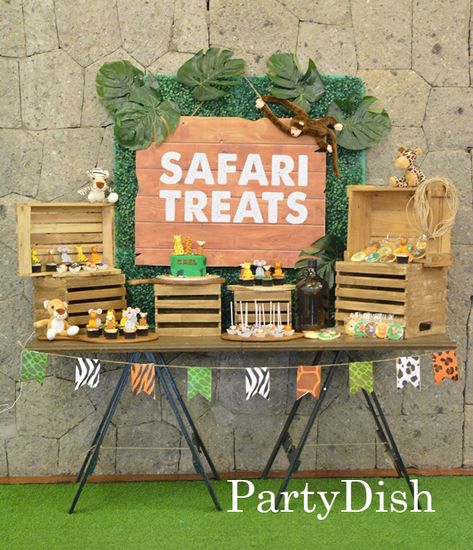 Safari themed Dessert and Candy buffet Wild One Dessert Table Ideas, Safari Bar Ideas, Safari Food Table Ideas, Jungle Safari Dessert Table, Savannah Birthday Party, Sweet Table Safari Theme, Jungle Safari Table Decorations, Candy Table Safari, Dessert Table Safari Theme