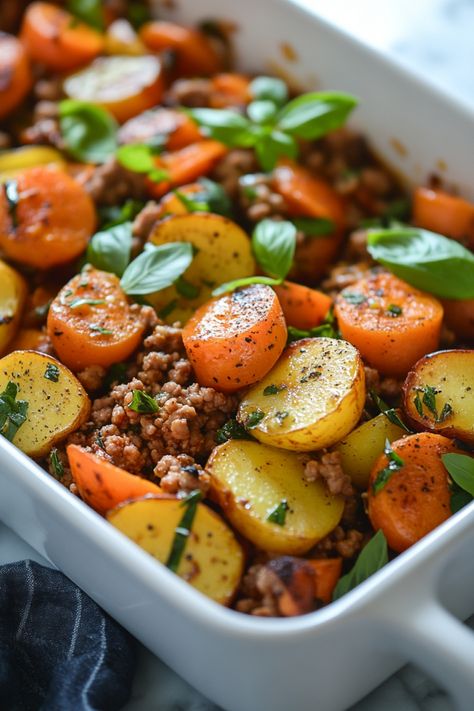 Roasted potatoes and carrots with ground meat and fresh basil in a white baking dish. The Best Ground Turkey Recipes, One Pot Meals Healthy Ground Beef, Healthy Meal Prep For The Week Ground Turkey, Ground Turkey Sheet Pan Dinner, Ground Turkey Recipes With Sweet Potato, Group Turkey Recipes Healthy, Lunch Ideas With Turkey, Grown Turkey Recipes, Weeknight Family Dinner Ideas Healthy