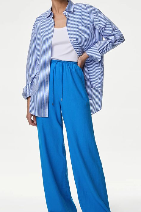 This linen pants outfit is perfect for the summer. These blue linen pants are a great addition to any business casual outfits for spring and summer. This is a staple for any women's summer work outfit. Summer office outfits will be that much more glamourous with some blue linen trousers! Work Outfit Summer Office, Linen Pants Summer Outfit, Work Outfit Summer, Casual Outfits For Spring, Pants Summer Outfit, Blue Linen Trousers, Summer Work Outfit, Blue Linen Pants, Linen Pants Outfit