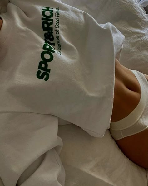 A Woman, Bed, Green, White