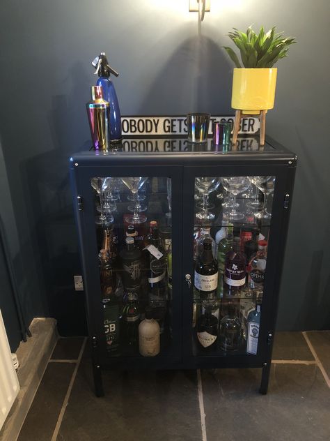 Gin cabinet. Ikea Fabrikor cabinet in blue Ikea Fabrikor Hack, Alcohol Display Cabinet, Ikea Drinks Cabinet, Bar Cabinet Ikea, Alcohol Cabinet Ideas, Ikea Display Cabinet, Drinks Cabinet Ideas, Fabrikor Cabinet, Ikea Fabrikor