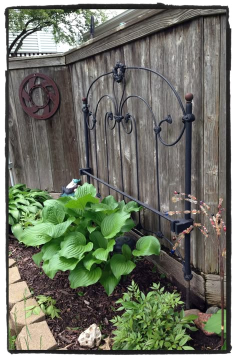 Antique brass headboard painted black Brass Headboard, Iron Bed Frame, Plant Containers, Iron Bed, Wooden Fence, Garden Gate, Garden Stuff, Garden Gates, Garden Yard