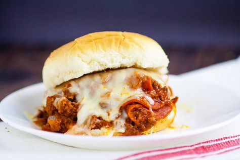 Pizza Sloppy Joes Recipe - Quick and easy Pizza Sloppy Joes recipe is saucy and cheesy with everything you love about pizza and can be made in just 30 minutes for a simple quick and easy family dinner recipe!  Look at that cheese! Yum! Pizza Sloppy Joes Crock Pot, Pizza Sloppy Joes, Epic Sandwiches, Joes Pizza, Cowboy Recipes, Gameday Food, Crockpot Ideas, Marinated Salmon, Scooby Snacks