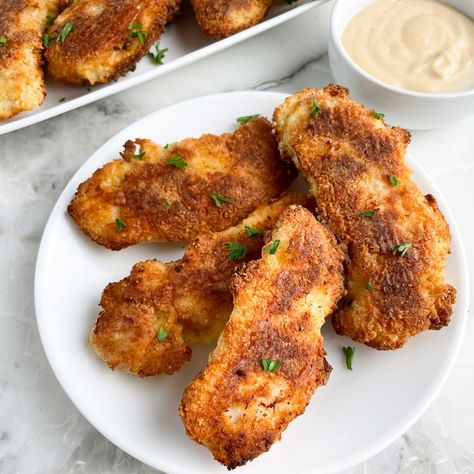 Bisquick Chicken Tenders Bisquick Recipes Chicken, Bisquick Chicken Tenders, Crunchy Chicken Tenders, Bisquick Chicken, Baked Chicken Strips, Chicken Tenders Recipe, Crispy Chicken Tenders, Zesty Sauce, Baked Chicken Tenders