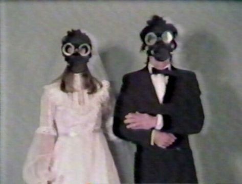 Gas Masks, A Man, Wall, Dresses