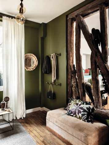 A collection of original beams acts as a divider between the entrance hall and the kitchen-diner, while retaining the sense of openness that Camille loves. Farrow Ball Bancha, Living Room Wall Color, Room Wall Colors, Living Room Color Schemes, Room Color Schemes, Green Walls, Brown Living Room, Living Room Green, Elegant Living Room