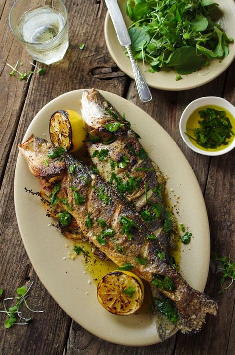 You know that whole branzino you see on every fancy menu? It’s pretty easy to prepare at home. Whole Trout Recipes, Baked Whole Fish, Whole Fish Recipes, Roast Fish, Fish Restaurant, Trout Recipes, Plats Healthy, Fish Dishes, Seafood Dishes