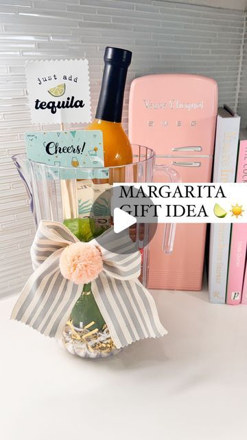 Shelby | Gift-in-a-Box Guide on Instagram: "We love a loophole 👏🏼  This “Just Add Tequila” gift makes the perfect unique Teacher Appreciation gift idea - OR a hostess gift, closing gift, birthday gift etc this summer   Put your favorite margarita making ingredients in a pitcher, add a gift card for them to pick out their liquor of choice and voilà  *Comment SUPPLIES for everything I used to put this gift together 🍋‍🟩☀️  #diy #teacherappreciationweek #teacherappreciation #giftcardholder #diygifts #diygift #giftbaskets #giftbasket #margarita #teachergift #teachergifts #teachergiftideas #momdiy #howto #teachersofinstagram #teachersofinsta #targetfinds" Wine For Teachers Gift, Margarita Teacher Gift, Margarita Christmas Gift, Gifts For Margarita Lovers, Pitcher Gift Basket Ideas, Margarita Basket Ideas Gift, Margarita Gift Ideas, Summer Hostess Gift Ideas, Margarita Basket Ideas