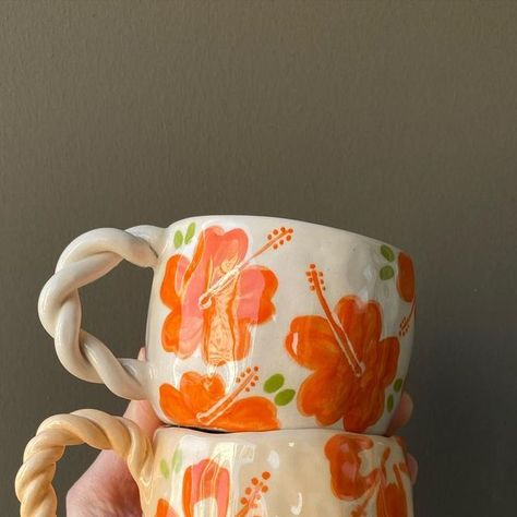 wingedpupa ceramics on Instagram: "Hibiscus team🧡" Tropical Pottery Painting, Summer Mug Ideas, Clay Painting Ideas Mugs, Clay Cup Designs, Painted Mug Designs, Ceramic Painting Flowers, Mug Ceramic Ideas, Tropical Pottery, Pottery Painting Flowers