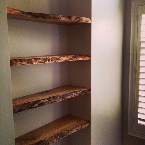 Live Wood Edge Shelves, Live Edge Wood On Walls, Reclaimed Wood Shelves Living Room, Raw Wood Floating Shelves, Live Edge Wood Bookshelf, Raw Edge Shelf, Rough Edge Wood Shelves, Live Edge Wood Floating Shelves, Live Edge Bookshelf Built Ins