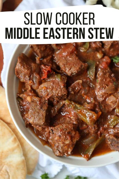 This slow cooked Middle Eastern Beef Stew is a hearty and flavorful stew made with cubed beef, vegetables and a mixture of warm and aromatic herbs and spices. This is a set it and forget it crock pot dinner that turns out incredibly flavorful and warming. What I love about this is dish is just how easy it is. It's a dump and go crock pot dinner with very little preparation. It's a great dish for holidays, family dinners and gatherings. via @Tastyovenlovin Beef Cubes Recipe Crock Pots, Middle Eastern Beef Stew, Cubed Beef Recipes, Shabbat Dinner Recipes, Braised Beef Recipes, Crock Pot Dinner, Slow Beef Stew, Onions And Tomatoes, Middle East Recipes