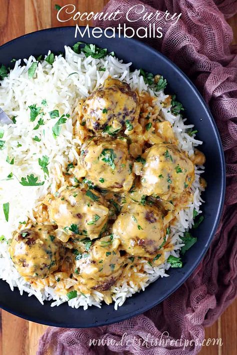 Coconut Curry Meatballs Recipe -- Ground beef is combined with curry powder and spices, then shaped into meatballs, baked, and served in a creamy, coconut curry sauce. For an amazing meal, serve these meatballs over rice, with naan for soaking up the extra sauce. Meatballs Over Rice, Coconut Curry Meatballs, Creamy Coconut Curry, Meatballs Baked, Curry Meatballs, Coconut Curry Sauce, Hearty Lunch, Naan Recipe, Lamb Dishes