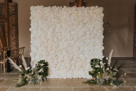 The Perfect White Wedding Backdrop 🤍 TOP TIP - Ask your florist to make two floor standing arrangements that match the rest of your Florals perfectly, to sit either side of our Ivory Flower Wall for a beautifully finished Backdrop 🤍 Beautiful photo thanks to @bloomweddingsuk 📷 Flower Wall Wedding Ceremony Backdrop, Photobooth Wall, Photobooth Backdrop, Rose Gold Wedding Decor, Foliage Arrangements, Flower Backdrop Wedding, Photo Booth Backdrop Wedding, Ceremony Aisle, Booth Wedding