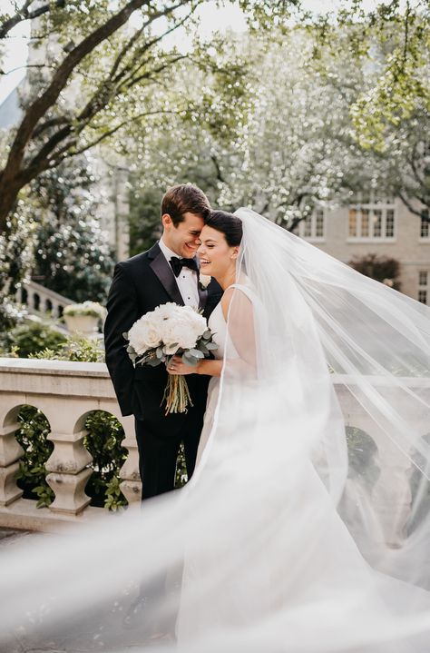 Cathedral veil on the bride in a portrait on the wedding day outside at highland park united methodist church Cathedral Veil Pictures, Bride And Groom Veil Photos, Long Veil Wedding Photography, Cathedral Veil Wedding Photos, Wedding Photos With Veil, Classic Wedding Portraits, Wedding Photography Bright And Airy, Wedding Veil Photography, Veil Pictures Wedding