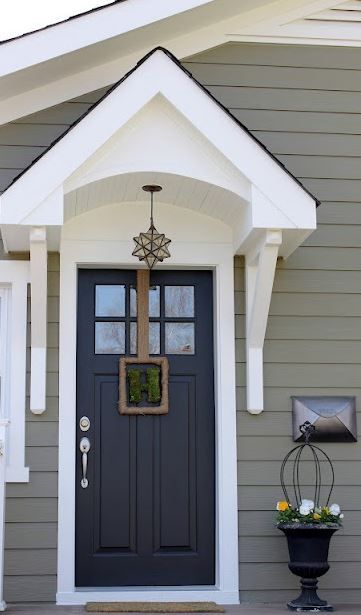 Fabulous Front Door Paint Ideas | Hirshfield's Storm Cloud Gray Benjamin Moore Exterior, Grey House Navy Door, Sw Connected Gray Exterior, Exterior Paint With Stone, Gray Houses, Navy House, Gray Siding, Pinterest House, Door Overhang