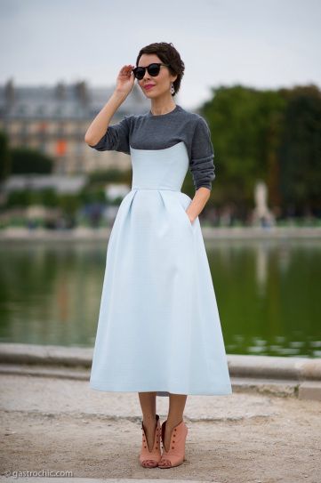 Winter Outfit Idea - grey sweatshirt under a feminine fit and flare midi dress + peach ankle boots | StyleCaster T Shirt Under Dress, Shirt Under Dress Outfit, Dress With Shirt Underneath, Shirt Under Dress, Sweatshirt Dress Outfit, Dress In Winter, How To Wear Shirt, Below The Knee Dresses, Wear To Work Dress