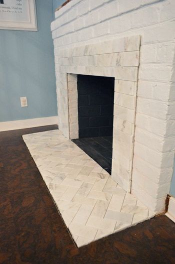 Fireplace Makeover: Sublime Subway | Young House Love love the combo of straight and herring bone pattern Fireplace Hearth Tiles, Hearth Tiles, Fireplace Redo, Fireplace Tile Surround, Build A Fireplace, Brick Fireplace Makeover, Small Fireplace, Concrete Fireplace, Young House