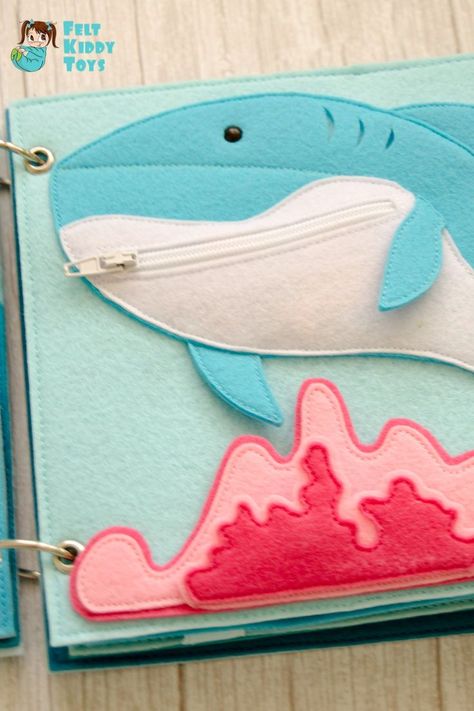 PDF sewing pattern and tutorial to make Sea quiet book from felt. As a result of your crafting, you will have a very cute quiet book for a toddler. DIY a perfect gift! Pattern, Tutorial and SVG files are included. Binding Quiet Book, Quiet Book Tutorial, Diy Busy Books, Quiet Book Pages, Felt Toys Diy, Sea Shark, Quiet Book Templates, Baby Quiet Book, Diy Quiet Books