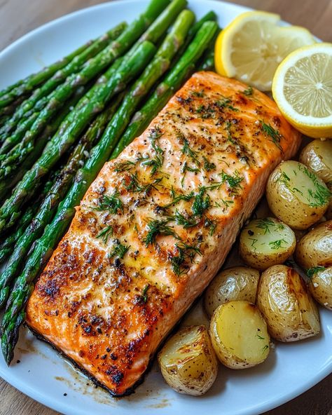 Grilled Salmon with Roasted Potatoes and Cheesy Asparagus: A Perfectly Balanced Meal Salmon New Potatoes, Salmon With Roasted Potatoes, Salmon Asparagus Potatoes, Roasted Salmon And Veggies, Baked Salmon Side Dishes, Steak And Salmon Dinner, Fish And Asparagus Recipes, Salmon With Potatoes, Salmon Potatoes