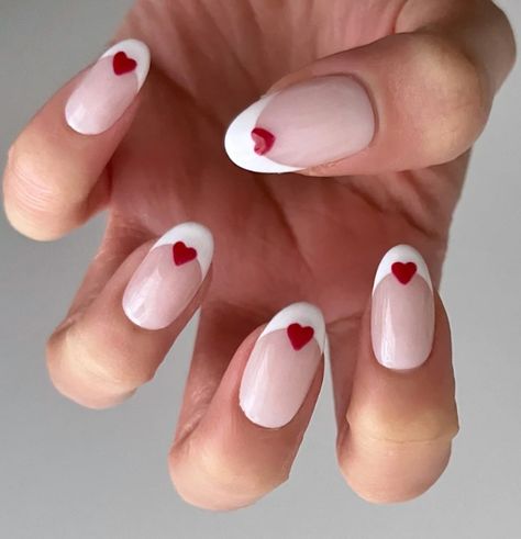 0x French Tips Nails with Red Heart✨ A classic white French manicure, decorated with cute love hearts! This combo is perfect for date night or a night with the girls♥️ 💅🏼Carefully hand-painted and cured with clear gel polish and red heart sequins, these nails will have friends thinking you just walked out of the nail salon! Glossy and shiny, wear of up to 2 weeks. INCLUDES: - 10x hand-painted press on nails - 1x nail glue (UK only for shipping purposes!) - 1x prep wipe SIZING: Heart French Tips, Cute Love Heart, Romantic Nails, French Tips, Romantic Look, Heart Nails, French Tip Nails, Valentine's Day Nails, French Manicure