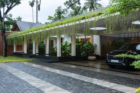 The House of 3 Courtyards Total Area : 7500 sqft Location: Arankavu, Kerala . For more: @silpiarchitects . Photo credit: @syamphotographer . #archdailyindia #architectures #tropicalarchitecture #youngarchitect #tropicaldesign #indianarchitect #modernarchitecture #decor #apartmentstyle #archidesign #archdaily #tropicaldesign #tropicalmodernism #architecture #design #kerala #architecture_hunter #elevation #apartmentdesign #minimalism #archilovers #landscapearchitecture #keralaarchitecture #kochi # Kerala Landscape Design, Plans Interior Design, Residence Landscape, Car Porch Design, Indian Houses, Kerala Architecture, Chainsaw Sharpener, Landscape And Urbanism Architecture, Vastu House