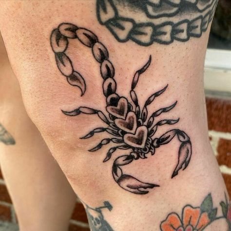 106 American Traditional Tattoo Ideas For A Timeless Look | Bored Panda Black Scorpion Tattoo, Traditional Scorpion Tattoo, Thigh Tattoo Designs, Scorpio Tattoo, Scorpion Tattoo, Tatuaje A Color, Tattoo Apprentice, Thigh Tattoos Women, Hip Tattoo