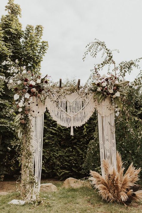 Macrame wedding backdrop with pampas grass and burgundy and white flowers | Image by The McLachlans Macrame Wedding Decor, Macrame Wedding Backdrop, Bohemian Wedding Decorations, Macrame Backdrop, Macrame Wedding, Wedding Ceremony Backdrop, Macrame Curtain, Ceremony Arch, Ceremony Backdrop