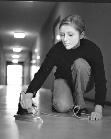 In this photograph, Eisenegger brings attention to issues concerning women’s roles in the domestic sphere. In this image, she irons the already level floor of a hallway, emphasizing the monotony and conformity of domestic tasks. Cindy Sherman Photography, The Male Gaze, Male Gaze, Appropriation Art, White Face Paint, Feminist Artist, Cindy Sherman, Photographers Gallery, Conceptual Photography