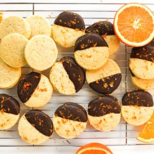 Chocolate Dipped Orange Shortbread Cookies - The View from Great Island Orange Shortbread Cookies, Easy Cookie Dough, Orange Shortbread, The View From Great Island, Plain Cookies, Orange Baking, Orange Cookies, Sweet Bar, Dipped Cookies