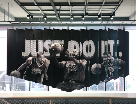 JUST DO IT. Flags - Nike Retail Visual Design on Behance Nike Office, Nike Event, Toilet Signage, Brand Wall, Nike Retail, Experiential Graphic Design, City Decor, Retail Interior Design, Showroom Interior Design