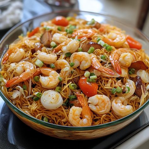 🍜🎉 Dive into Pancit Malabon Fiesta—a rich, savory noodle dish with seafood and a flavorful sauce. A true Filipino celebration! 🎉🍜 #PancitMalabon #FilipinoFeast Pancit Malabon Fiesta Ingredients: Pancit malabon noodles (1 package, 12 oz) Shrimp, peeled (1/2 lb) Squid, sliced (1/2 lb) Fish sauce (2 tbsp) Annatto powder (1 tbsp) Garlic, minced (4 cloves) Onion, chopped (1) Tomatoes, chopped (2) Shrimp broth (2 cups) Pork belly, diced (1/2 lb) Cooking oil (2 tbsp) Instructions: Heat oil in a ... Filipino Fish Recipes, Pancit Recipe Filipino, Pancit Sotanghon, Pancit Malabon, Shrimp Broth, Pancit Recipe, Instagram Recipes, Noodle Dish, Trending Recipes