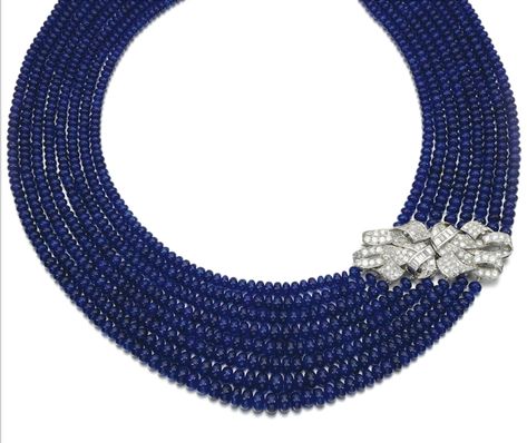 Safira e colar de diamantes, composto por oito linhas de graduado polidas esferas de safira, definido para o lado com um broche clipe duplo, de 1930, definido com corte circular e diamantes baguette Jewellery Design Gold, Latest Gold Jewellery, Blue Sapphire Jewelry, Stone Bead Jewelry, Dress Clips, Sapphire Beads, Lotus Jewelry, Beaded Jewelry Designs, Baguette Diamonds