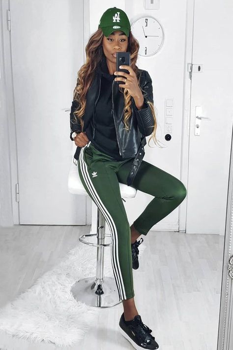 Green Adidas Pants With Moto Jacket Outfit #motojacket ★ Just like a little black dress, Adidas pants outfit is an irreplaceable wardrobe detail for a modern lady. You can’t even imagine how versatile this item is! Well, this post will help you out. See how to wear the classic black, pink, and red sweatpants with heels and combine them with a jean jacket. P.S. These ideas will never go out of fashion! ★ #adidaspants #adidas #adidasoutfit Green Adidas Pants, Sweatpants Outfit Women, Adidas Track Pants Outfit, Adidas Sweatpants Outfit, Adidas Pants Outfit, Adidas Leggings Outfit, Moto Jacket Outfit, Track Pants Outfit, Adidas Outfit Women