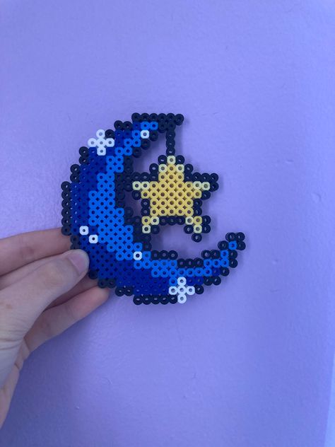 Cute handmade moon and hanging star perler bead creation blue and yellow moon and star cute and handmade perler beads Star Perler, Melt Beads Patterns, Hamma Beads Ideas, Easy Perler Bead Patterns, Perler Creations, Pokemon Perler Beads, Melty Bead Patterns, Pearl Beads Pattern, Easy Perler Beads Ideas