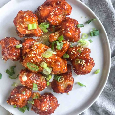 Korean Cauliflower Bites with Sweet & Spicy Chili Sauce Korean Cauliflower Bites, Unique Side Dishes, Spicy Cauliflower, Zesty Sauce, Cauliflower Bites, Spicy Chili, Toasted Sesame Seeds, Sweet Chili Sauce, Sweet Chili